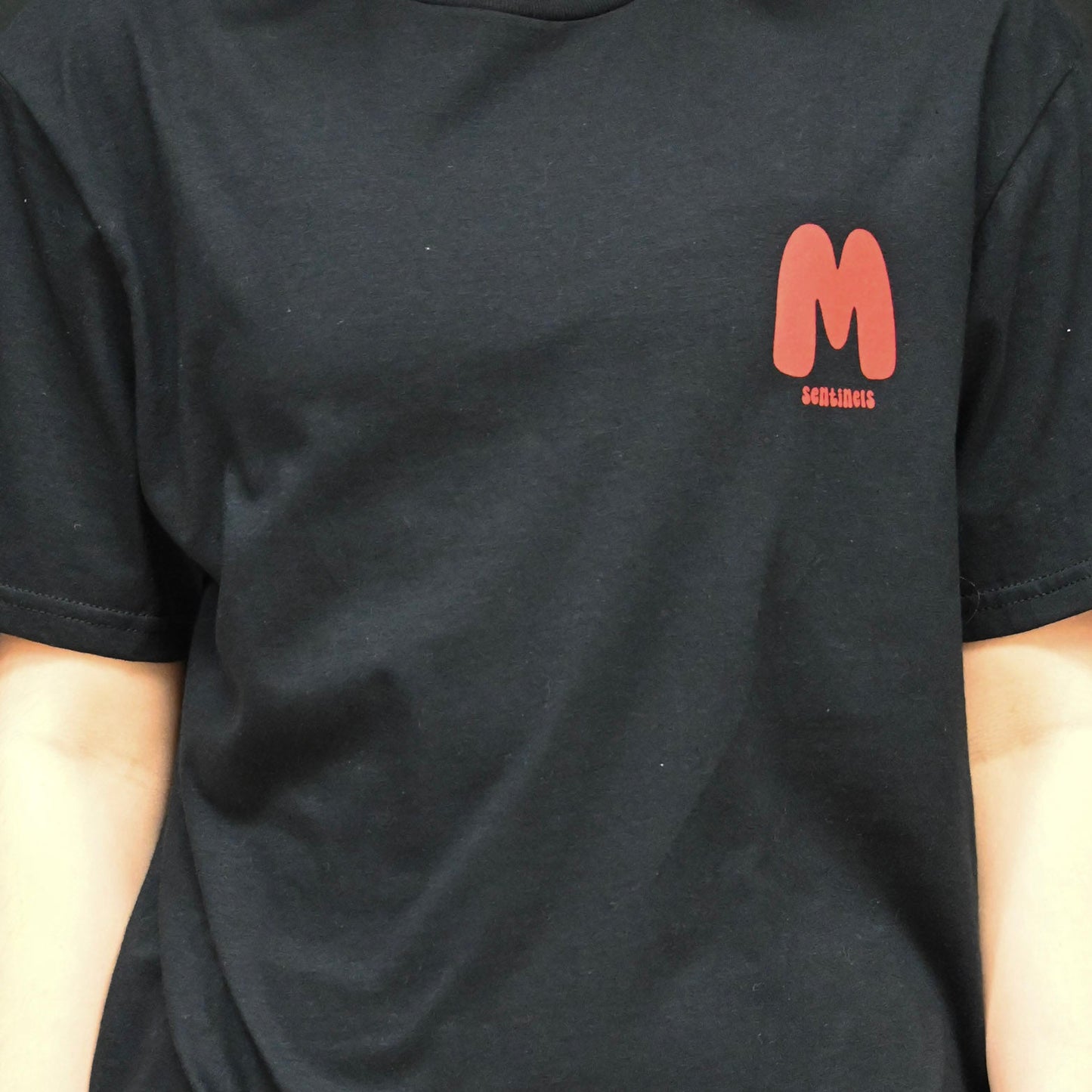 LIMITED OFFER: Bubble M pocket design with "BE THERE BE LOUD GO RED" on back T-Shirt
