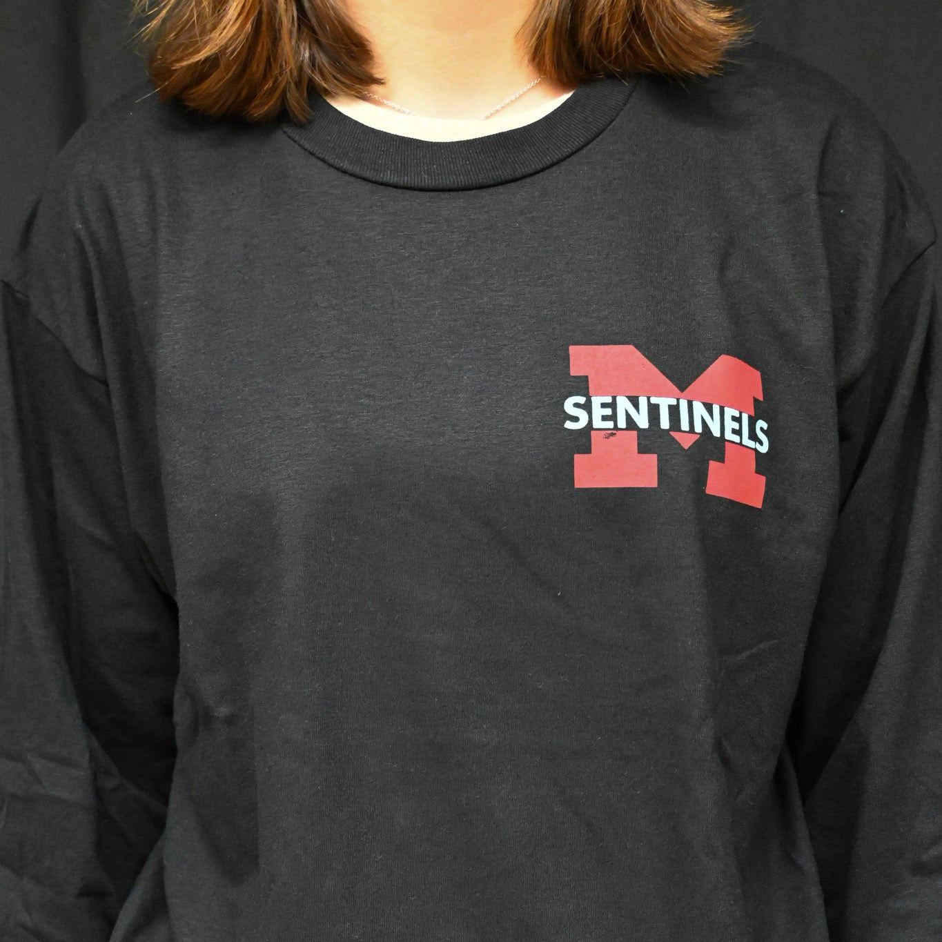 DISCOUNTED ITEM: BLACK LONG SLEEVE WITH POCKET SENTINELS "M" Design (slight damage on logo)