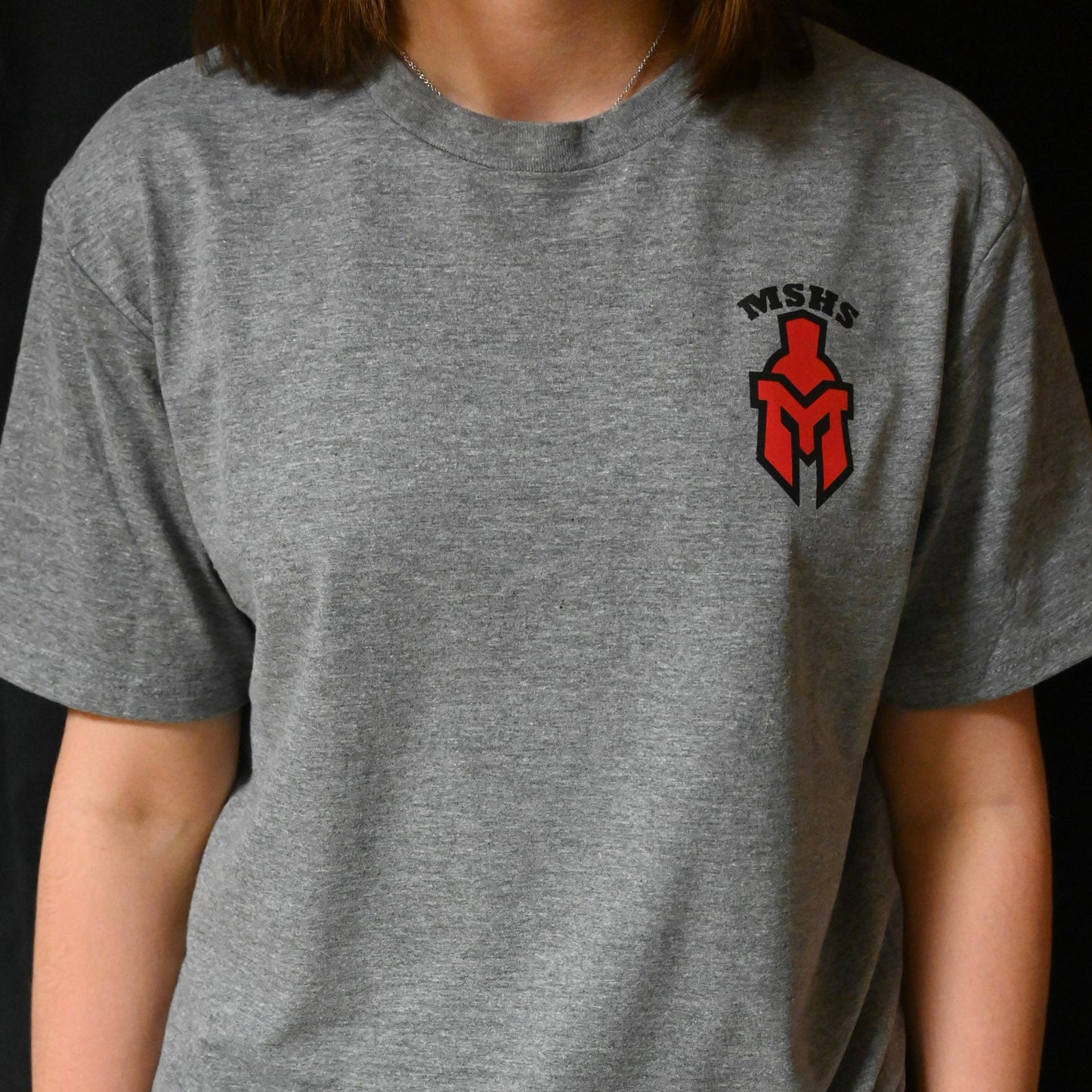 Pocket sentinel helmet on front with "BE THERE BE LOUD GO RED! " on back T-shirt