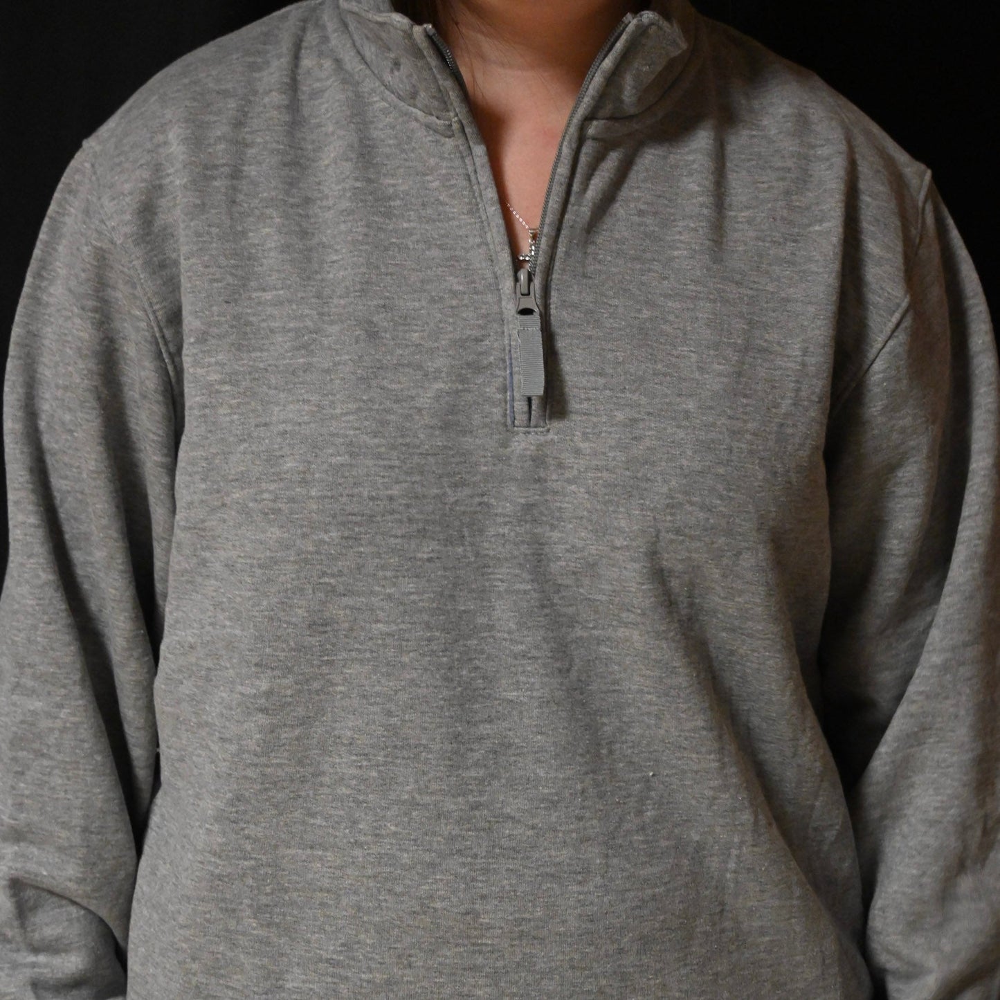 Half Sentinel Helmet with "Sentinels"written out pocket design on Quarter Zip