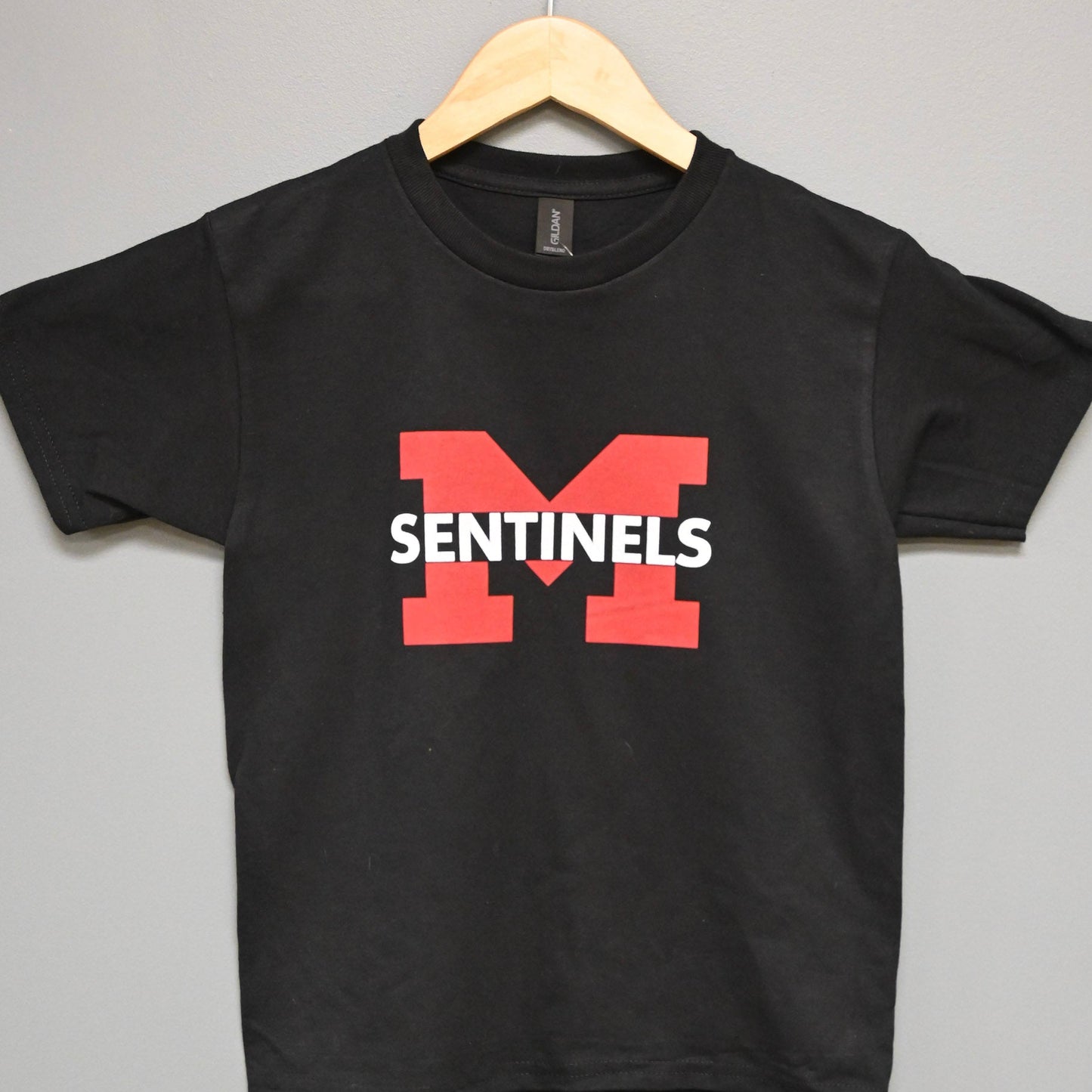 Black short sleeve with red and white Sentinels "M"